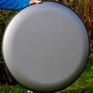 Gun metal grey disk.